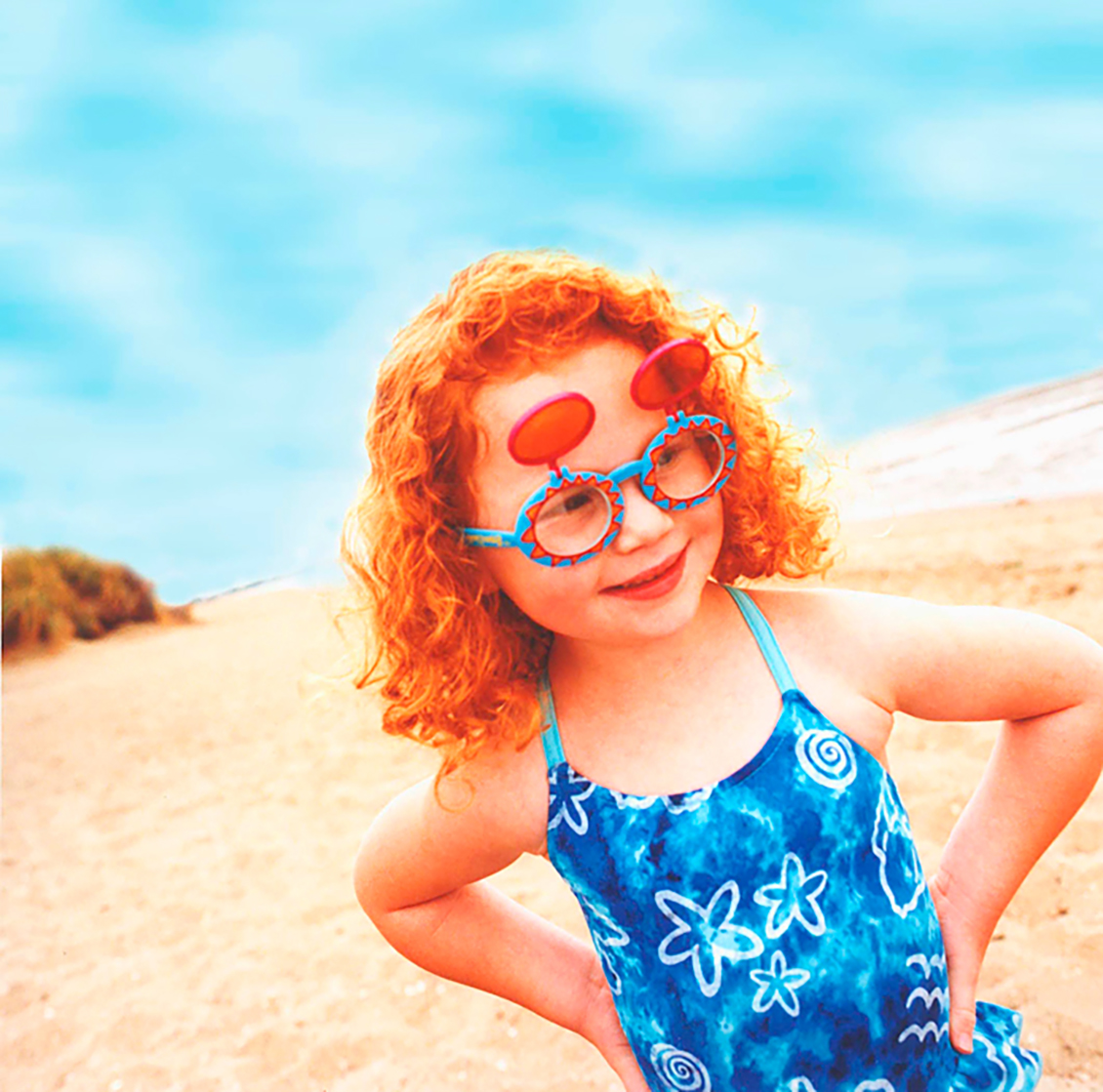 red head girl on beach creative director photography