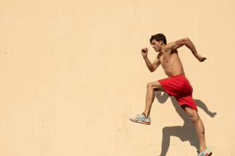 athletic man jumping motion photography