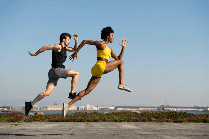 male and female athletes jumping movement photography